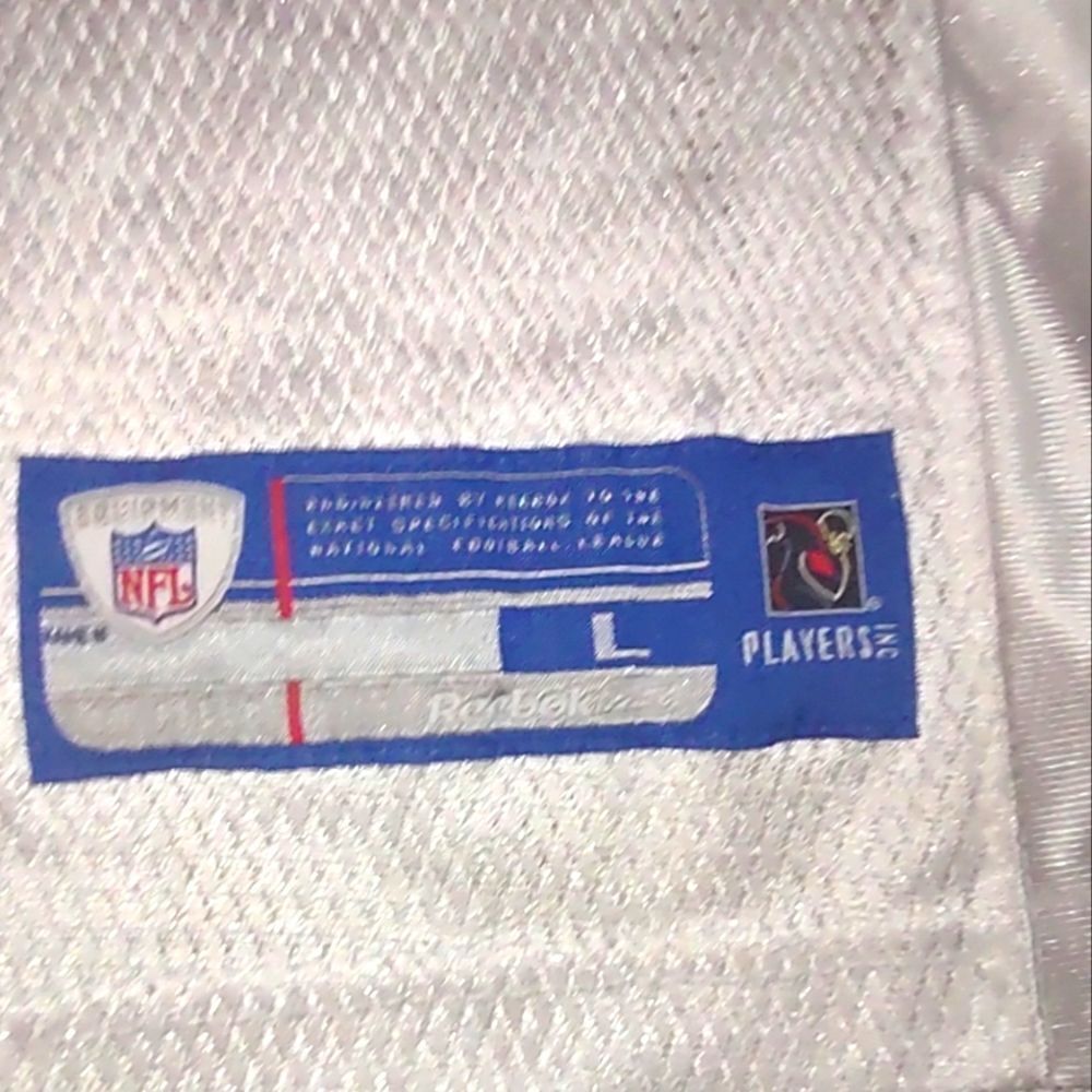 Manning # 18 Reebok man blue n white jersey size Large